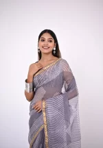 Nisha / A Kota Doria Hand block Saree